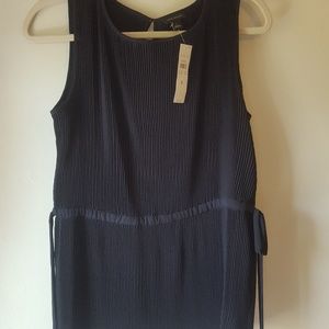 Ann Taylor sleeveless blouse, with side ties.